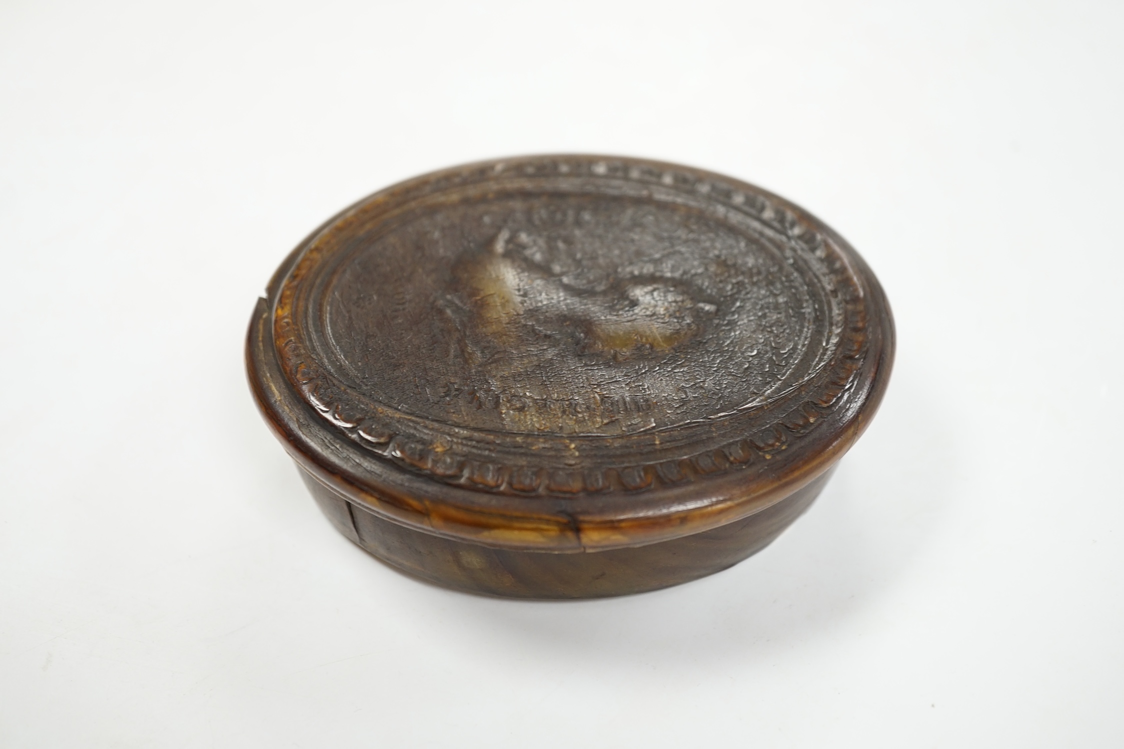 A rare mid 18th century pressed horn oval box by John Obrisset, Queen Caroline, signed, label inside box, 10cm high. Condition - good for age